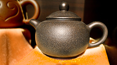 Purple-aubergine clay teapot