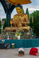 Buddha statue beside Botataung Pagoda