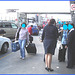 Attrayante hôtesse de l'air dodue en Talons Hauts / Chubby hot flight attendant smoker in high heels chatting woth work colleagues-  Aéroport PET airport- 18 octobre 2008 / Anonymes