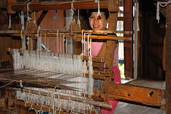 Silk weaver woman making the Yarn