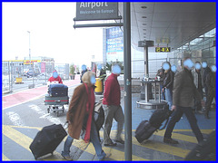 Blond mature in jeans and flat boots  /  Dame mature en  blue-jeans et bottes à talons plats  -  Brussels airport - 19 octobre 2008 /Anonyme