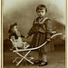 A Girl with Her Doll and Cart, Berlin