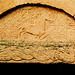 water stratford bucks. agnus dei c12 chip carved tympanum over North door, c.1130, showing strong saxon influence in the interlaced dragons of the lintel.