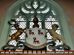 leathersellers' almshouses, high barnet, herts,arms of the livery company in the chapel built in 1866, with stag and ram supporters