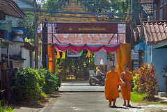 Monks enter the temple complex