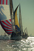 The big, colorful sail is called the spinnaker