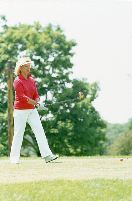 Dinah Shore plays golf