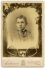 A Boy's Cabinet Card Portrait with a Tennis-Themed Border