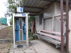 Banc et téléphone publique / Phone booth and long bench.