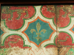 rochester cathedral painted screen,original section of panelling from back of pulpitum, with two layers of decoration, one of 1227, the other of the arms of edward  3 in 1340