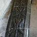 rochester cathedral c13 tomb,cross slab of purbeck marble of mid c13, with cross and streamers or scrolls, s.e.transept , similar to stone one at east shefford