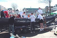 Navy cadets preparing their boat for transport