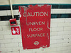 Caution uneven floor surface
