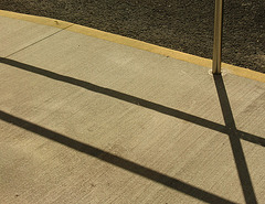 Lines. . sidewalk . . pavement..
