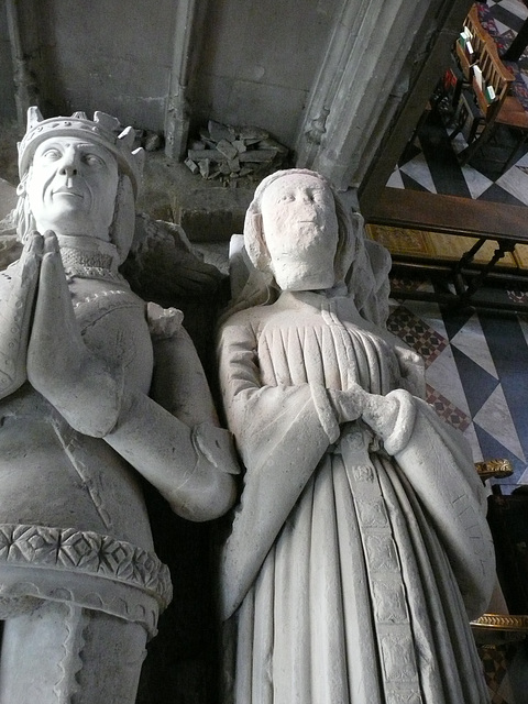 ely cathedral,tomb of john tiptoft, humanist earl of worcester and his two wives philippa and joyce. he died in 1470, beheaded. his over restored effigy sports the ss collar of the lancastrians