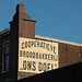 Repainted old advertisement for cooperative bakery "Our Goal"