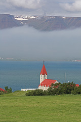 Church by a fjord