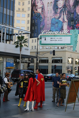 Superman, Batgirl, and Wonderwoman cruise Hollywood for tips