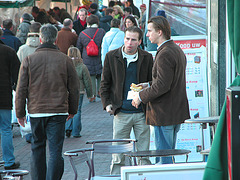Leiden students, eating on the weekly market in Leiden