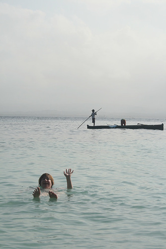 Jo waving - locals fishing