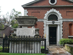 st.botolph bishopsgate, london,the 1838 tomb of william rawlins is in the graveyard of st.botolph bishopsgate next to the 1861 parish hall
