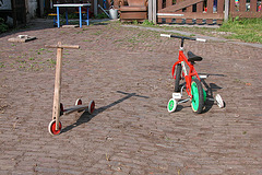 Abandoned child's scooter and bicycle