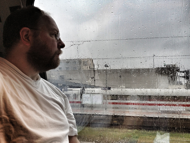 On a train in the rain
