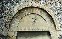 birchanger church, essex the best thing in this pleasantly situated but locked church is this early c12 south doorway, with scrolls around the arch and a lamb carved on the tympanum that is somewhat unsure of itself.