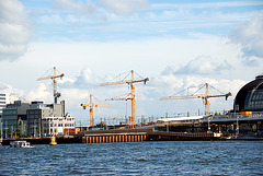 A trip with the steam tug Adelaar: cranes over Amsterdam