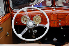Wood dashboard of a 1937 Ford Club Cabriolet 78-760-B