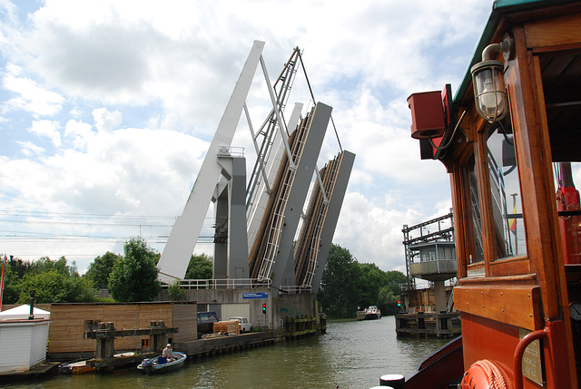A trip with the steam tug Adelaar: passing the railway bridge at Weesp
