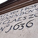 Lettering over the entrance of Saint Salvator's almshouse in Leiden