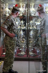 HRH Prince Charles admiring the regimental silver