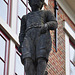 Statue of an orphan on the old orphanage in Leiden