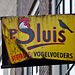 Signboard of P. Sluis, packed bird food