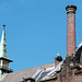 Things on rooftops: Little green tower and chimney