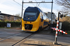 The intercity to Utrecht crossing the Morsweg in Leiden
