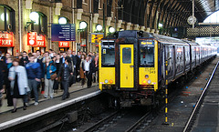 Commuters arriving at London King's Cross