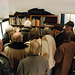 After the auction, people flocked to the bookcases to see the books of Karel van het Reve