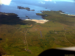 Aerial: View of Rwy 20 Island of Coll's new tarmac runway!
