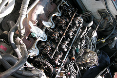 A Mercedes-Benz 230E engine without the camshaft cover