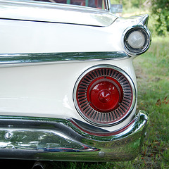 Oldtimer day at Ruinerwold: Rear light of a 1959 Ford Fairlane 500 Retractable Skyliner Galaxie