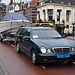 2000 Mercedes-Benz E 220 CDI Combi Taxi with a boat on tow