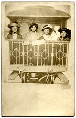 Four Women and a Doll on a Train