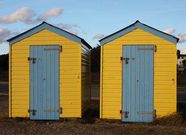 2 yellow beach huts