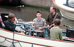 Making music in a boat - detail