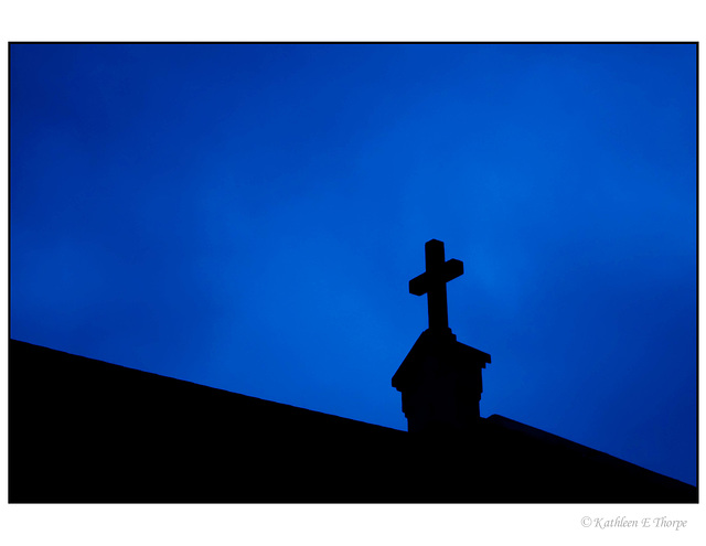 Silhouette Cross at Night