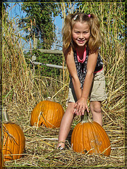Happy Pumpkin Girl Guarding Her Choice