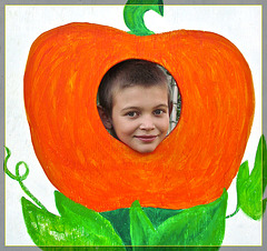 Boy in Pumpkin Cut-Out