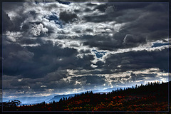 Cloudy Skies and Firey Landscape